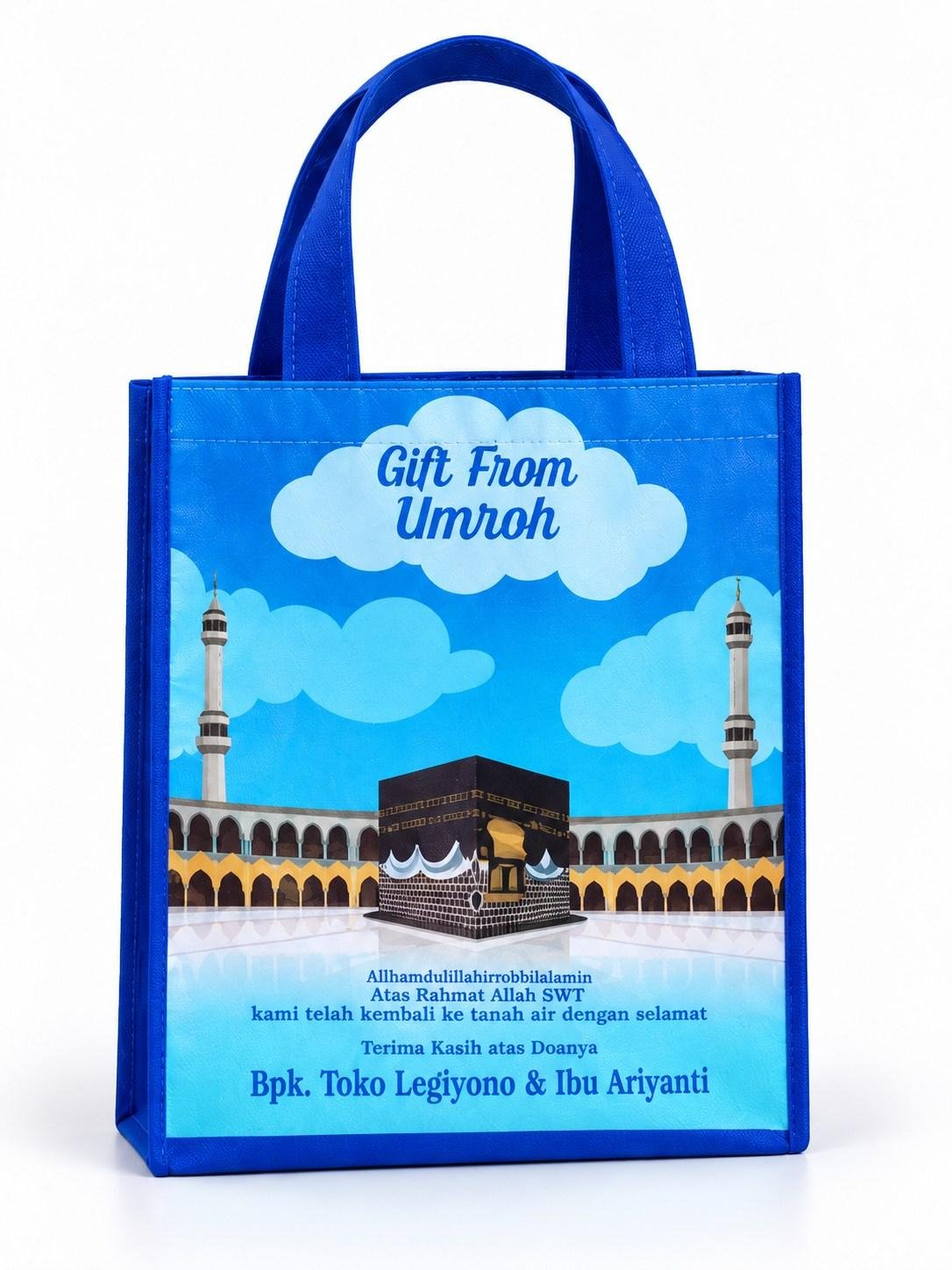 Tas spunbond biru dengan cetak warna bertema umrah