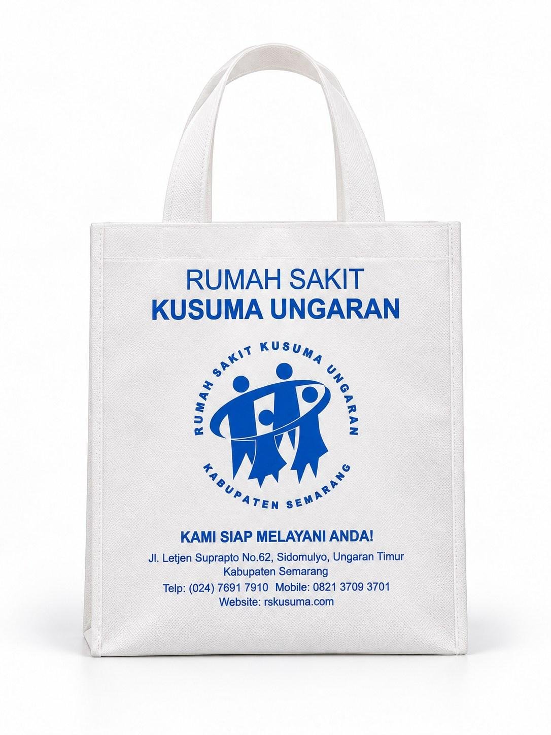 Tas spunbond putih dengan sablon biru bertema rumah sakit